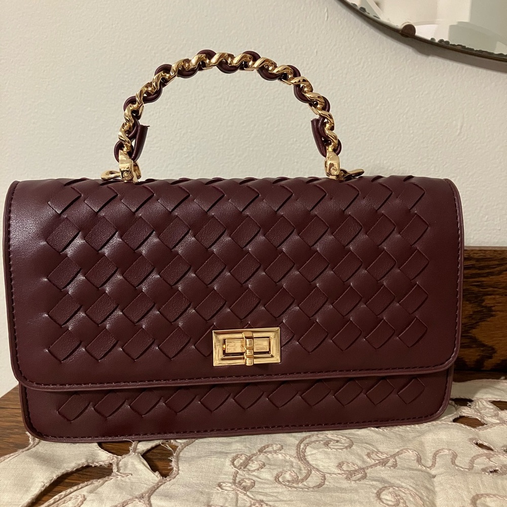Small burgundy clutch